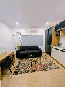 Sage Studio full lenght mirror and couch view.webp