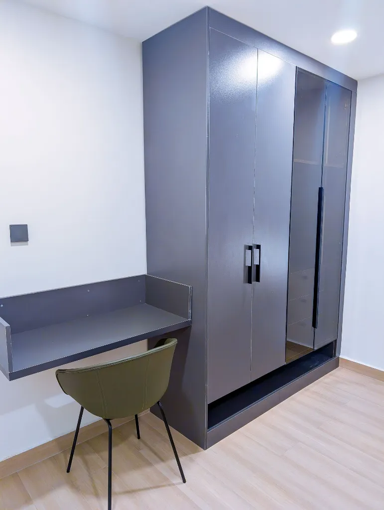 Room 106 work station and wardrobe.webp