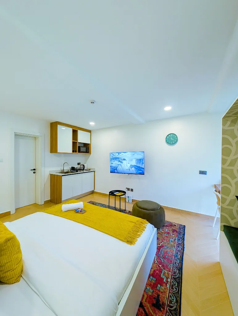 Room 205 Bedroom and Kitchenette view.webp