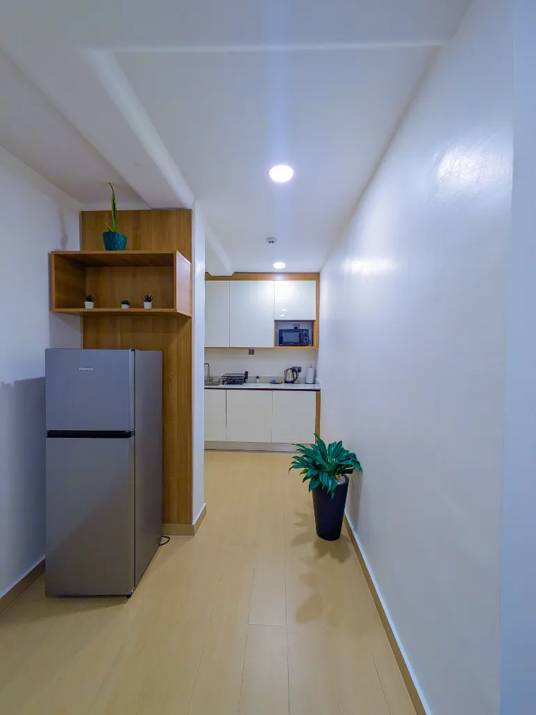 Room 206 Kitchenette with refrigarator view.webp