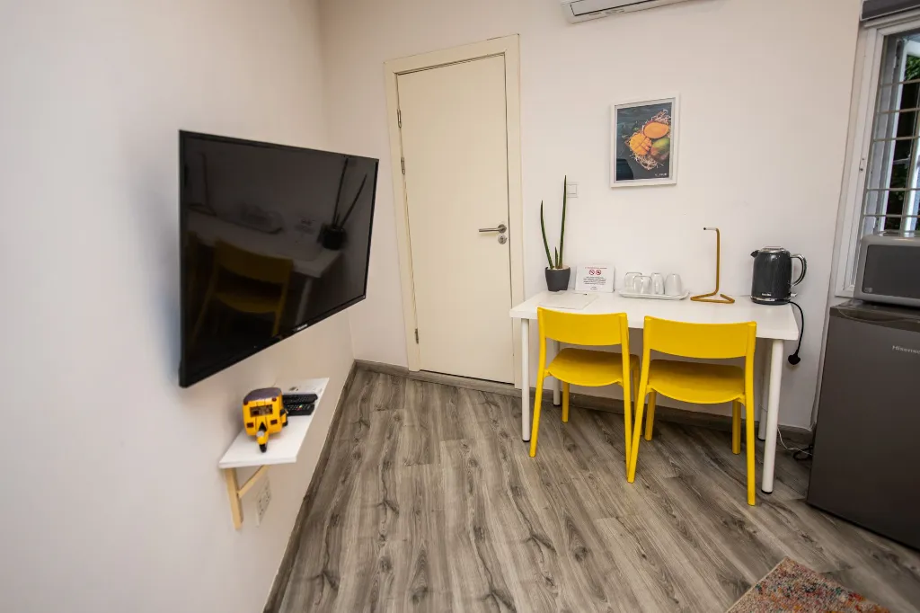 Mellow Studio Work station and refrigerator view.webp